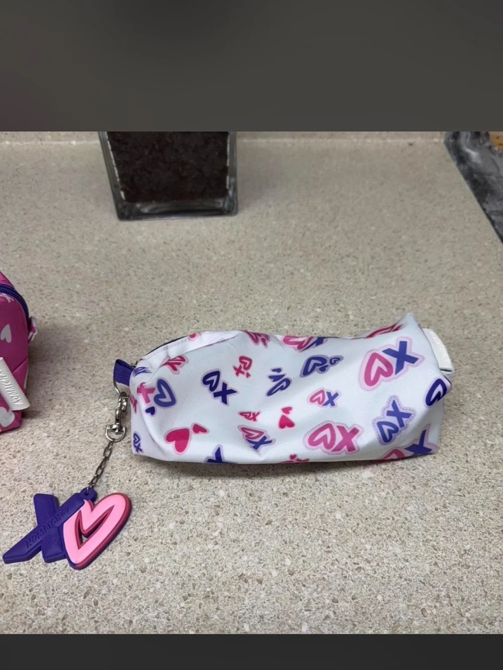 No match make up bags ,Xo Pattern White Cosmetic Pouch with Pink & Purple Charm
